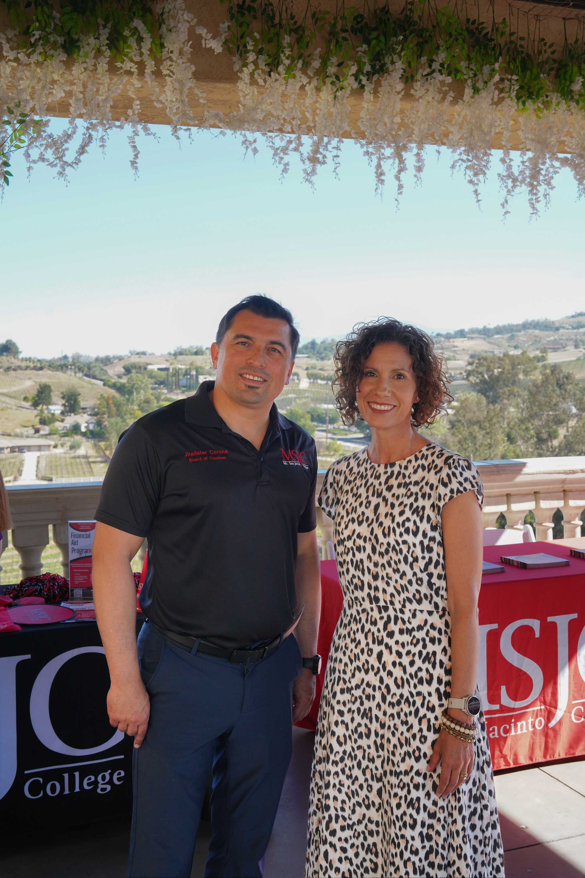 Truste Corona and Rebecca Teague Smiling and posing for the camera