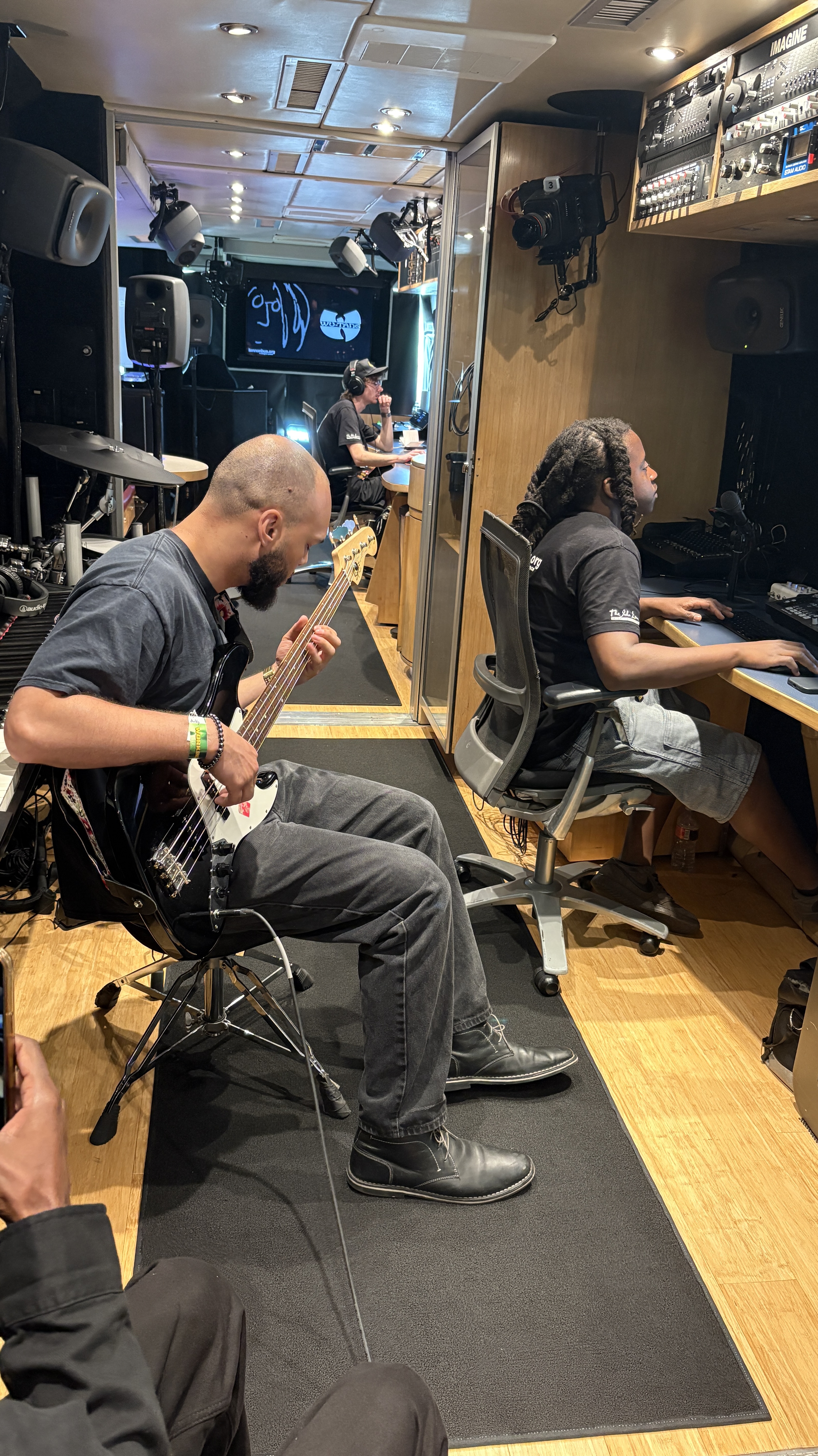 MSJC student Barry Paschal lays down a bassline while working alongside a professional sound engineer