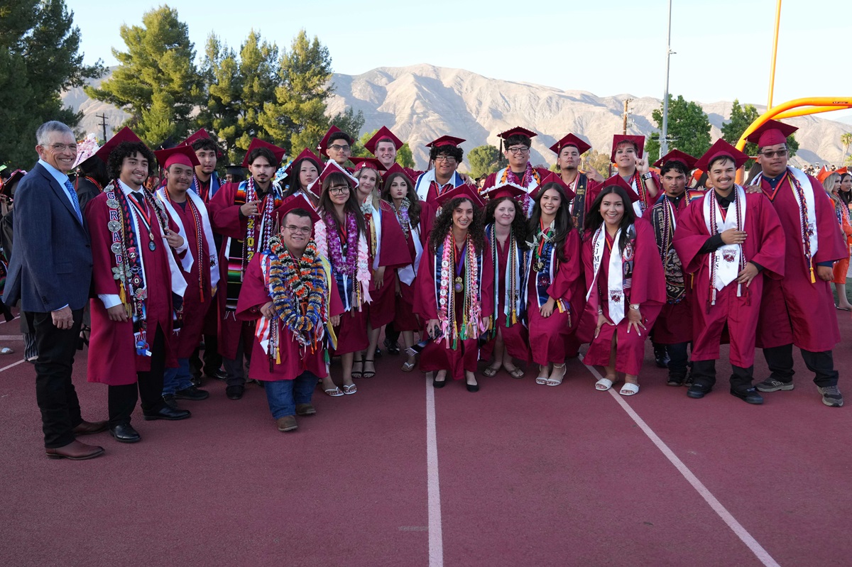 SJMCHS graduates with Trustee Smith