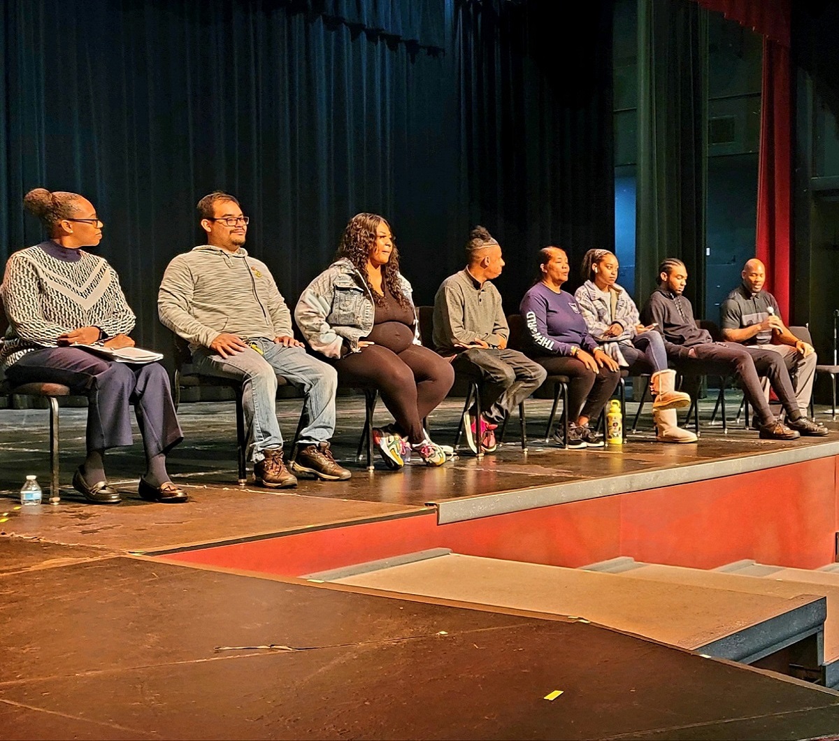 student panelists on stage in the San Jacinto Campus Theater