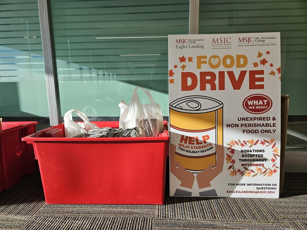 food drive bins and sign