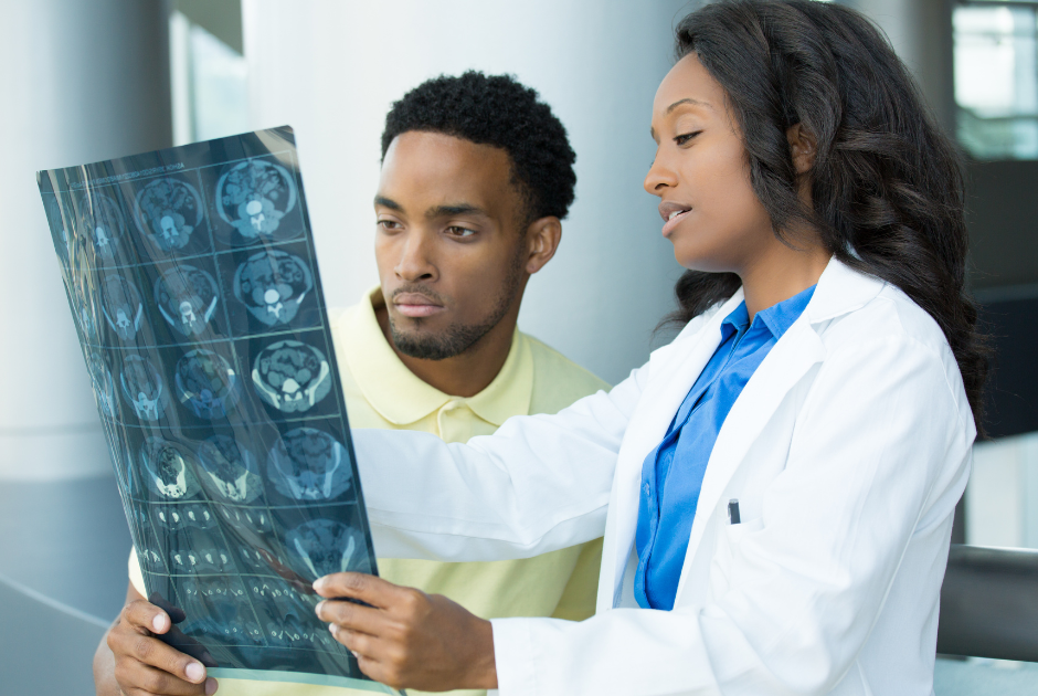 Doctor shows x-rays to patient