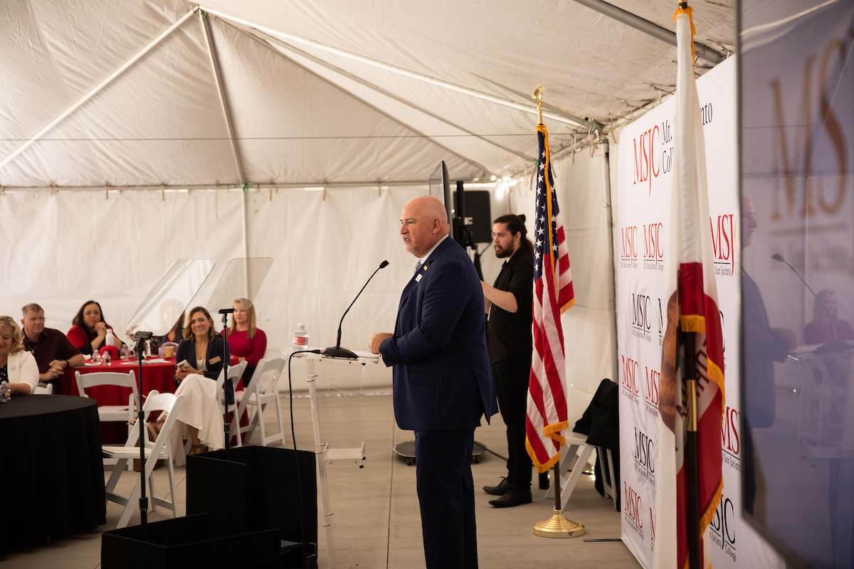 Dr. Roger Schultz at the podium
